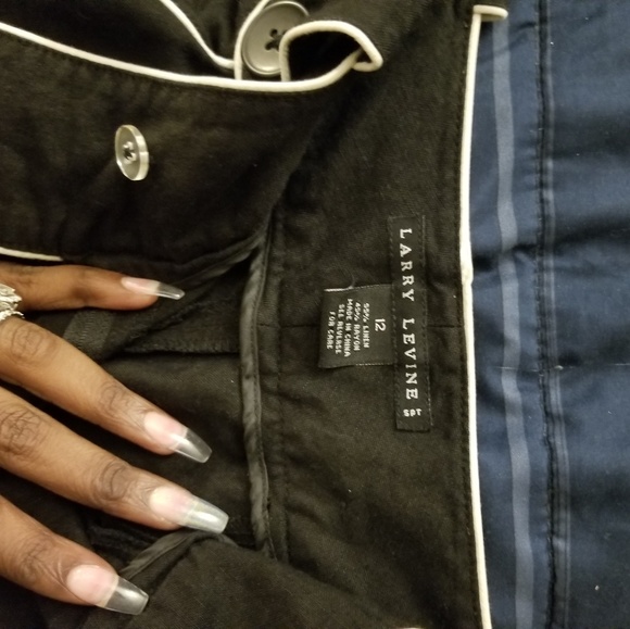 Black long shorts with white trim. - Picture 2 of 2